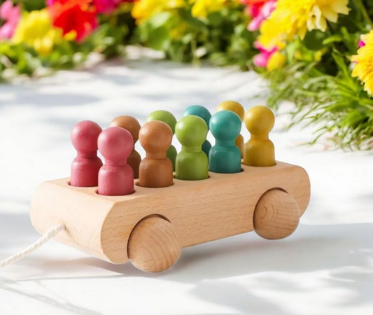 10 Wooden Peg Dolls and Pull Cart