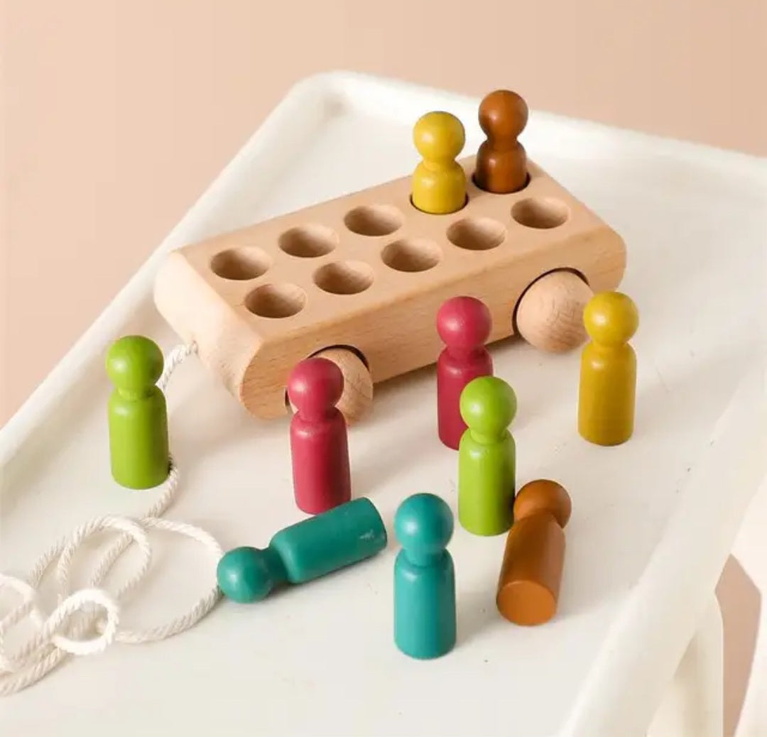 10 Wooden Peg Dolls and Pull Cart